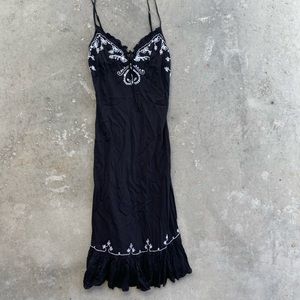 Women’s dress size XL but fits more like a M